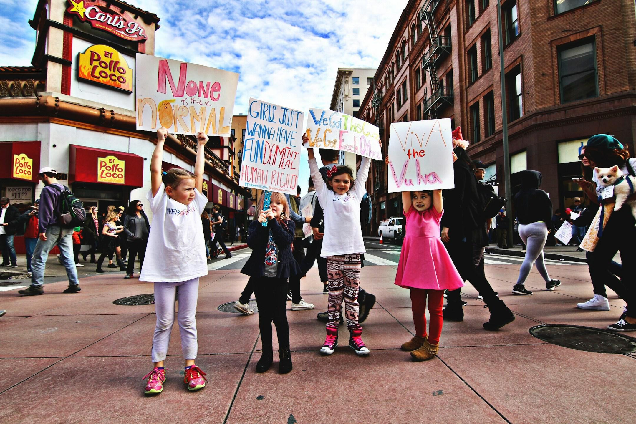 “Mama, look! Those girls have signs, too!” And those girls were just as excited as she was when we asked for a group photo. 
The future is female and the future is in our hands.