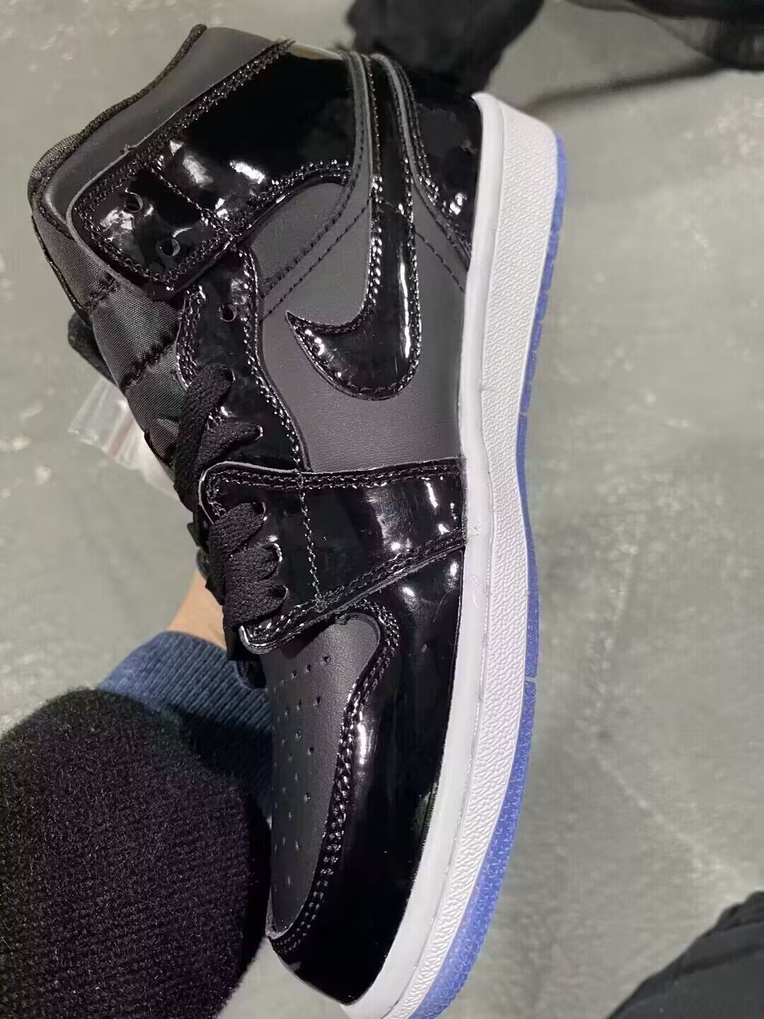 Air Jordan 1 Mid SE Space Jam DV1308-004 Black Patent Leather Icy Blue Outsole – alternate angle at SoleLow