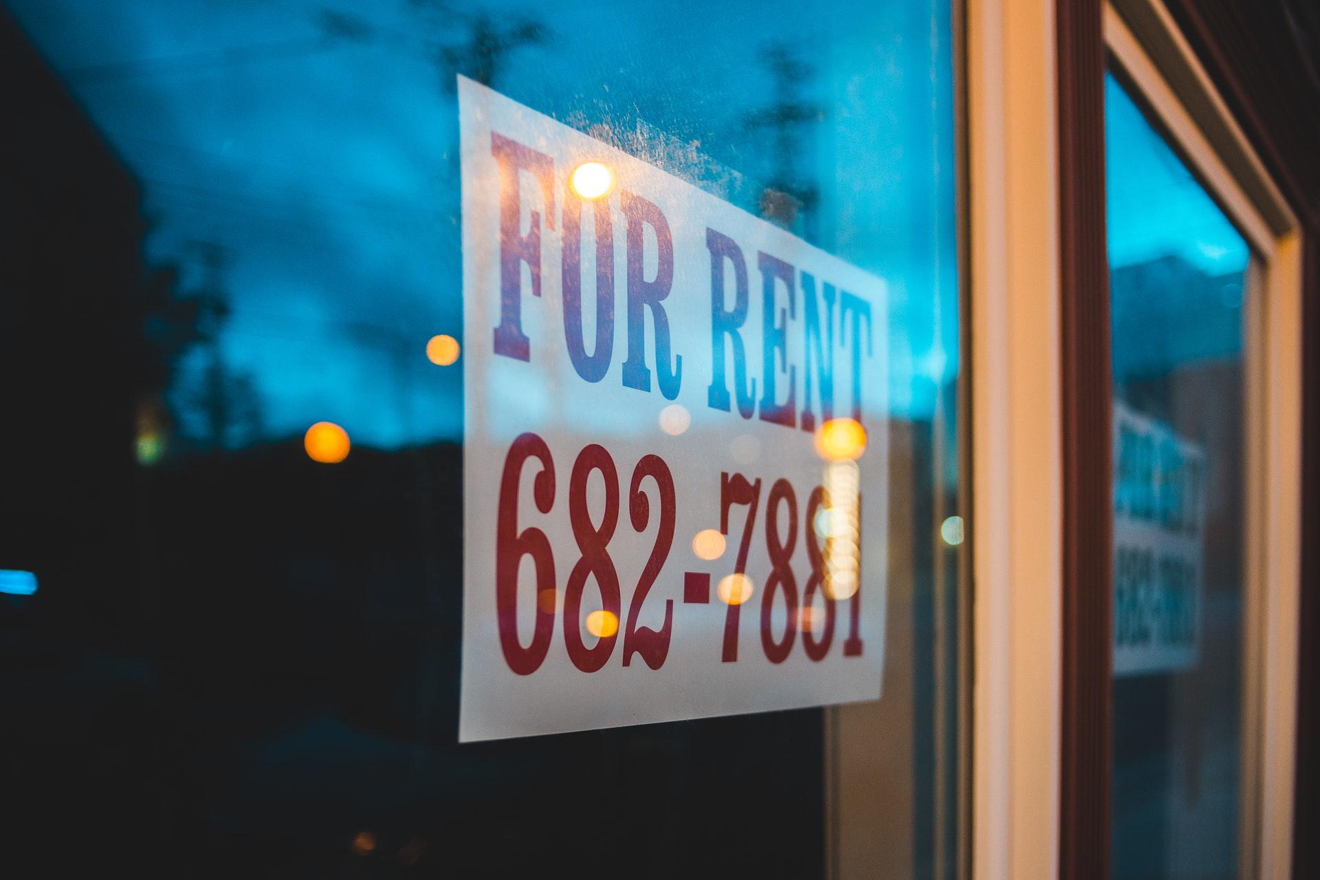 For rent sign on a building door