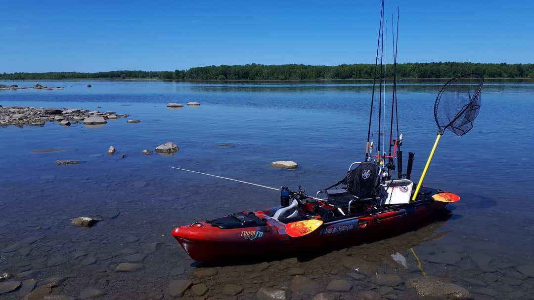 a kayak beached in a beatiful area.jpg