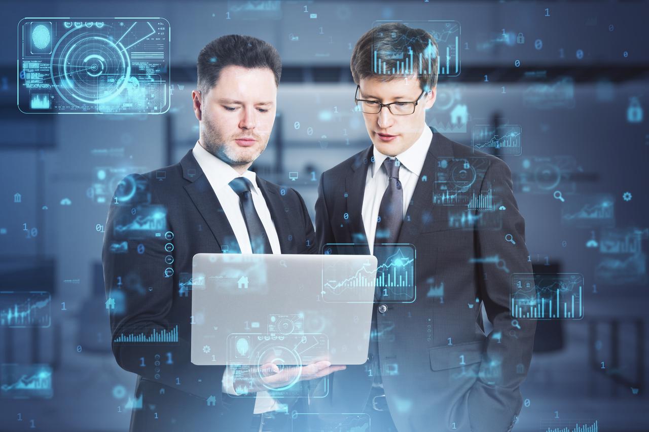 businessmen-analyzing-data-on-laptop-in-an-office-2026-01-11-08-39-24-utc.jpg