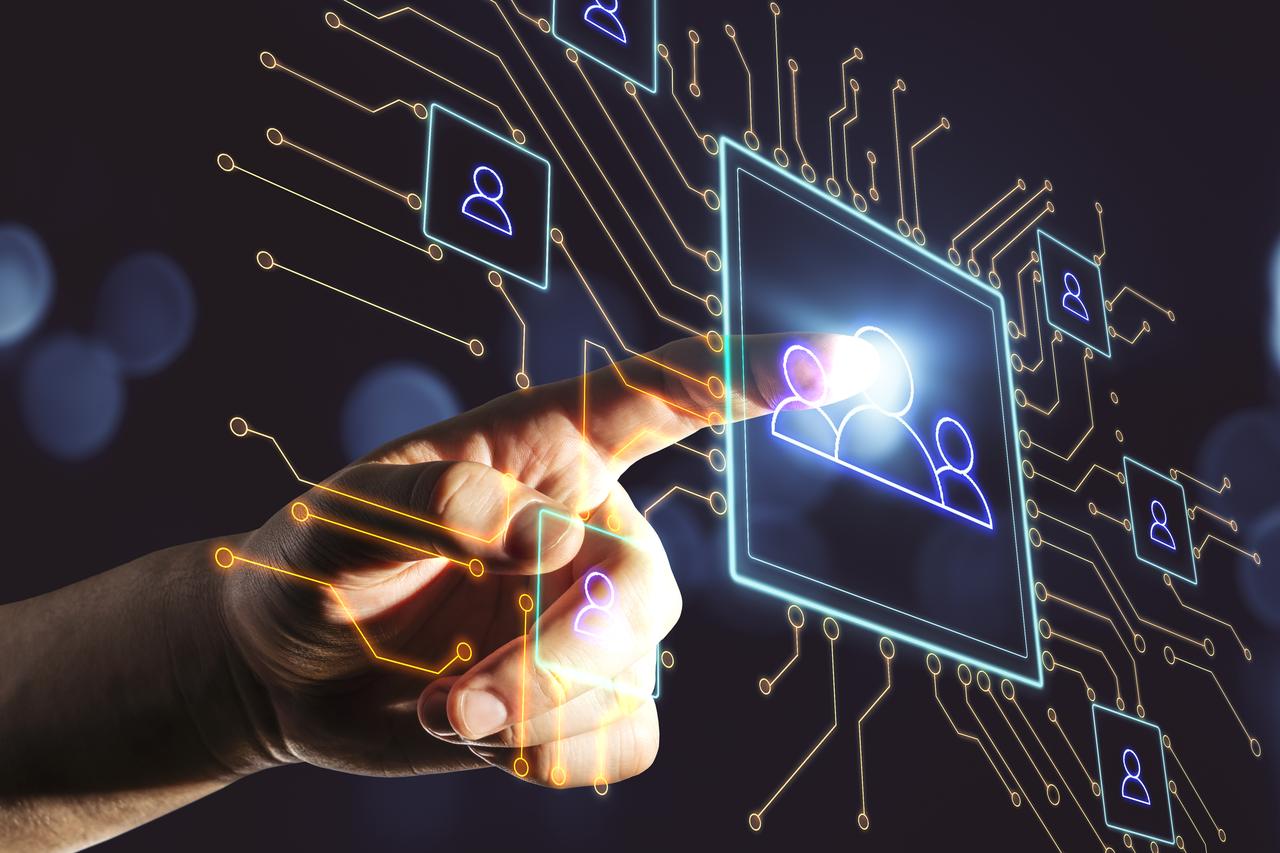 hand-using-social-network-hologram-and-glowing-hum-2026-01-11-08-32-42-utc.jpg