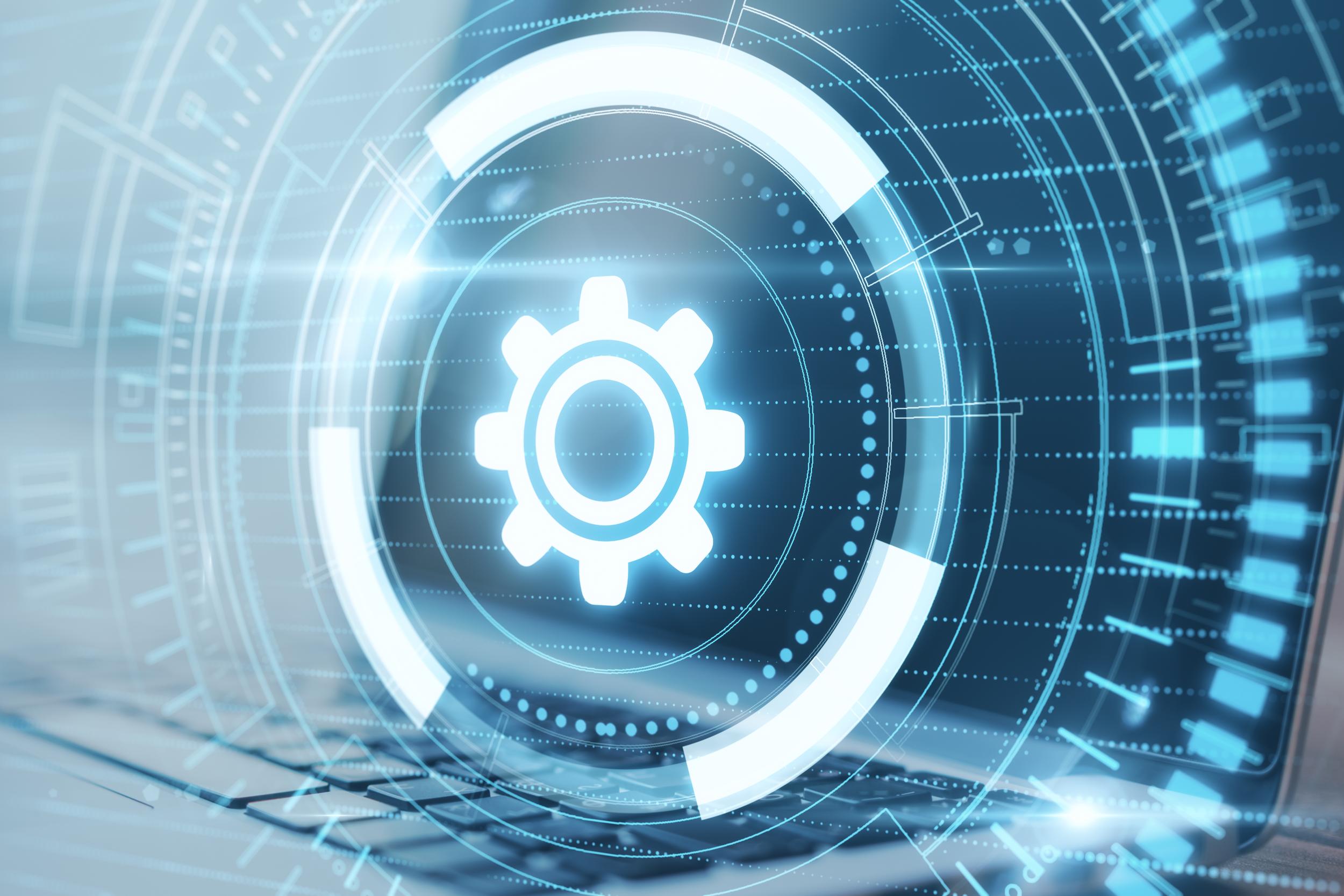 close-up-of-laptop-with-creative-glowing-cogwheel-2026-01-11-08-31-17-utc.jpg