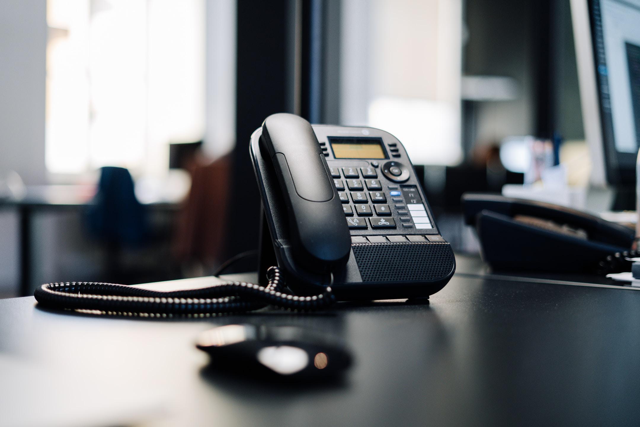 phone of a telecoms company following TRACED Act compliance guidelines