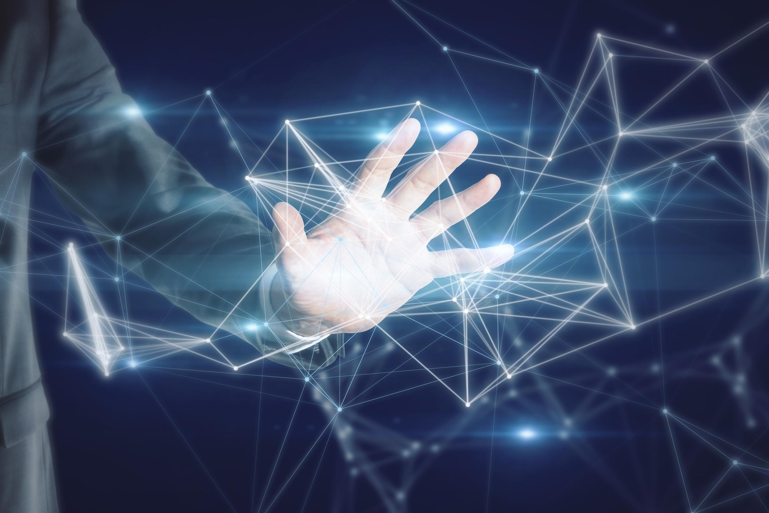 close-up-of-businessman-hand-holding-abstract-poly-2026-01-11-08-31-26-utc.jpg