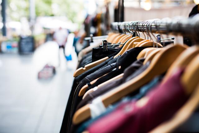 Hangers in a clothes store. A personal shopper in New York City will find the diamonds in the rough every time they shop for you.