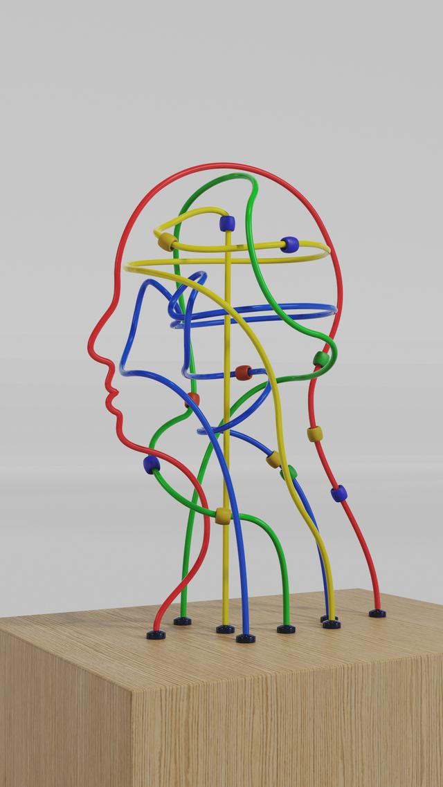Muddled mind – Childrens toy in the shape of a head. A conflicted mind