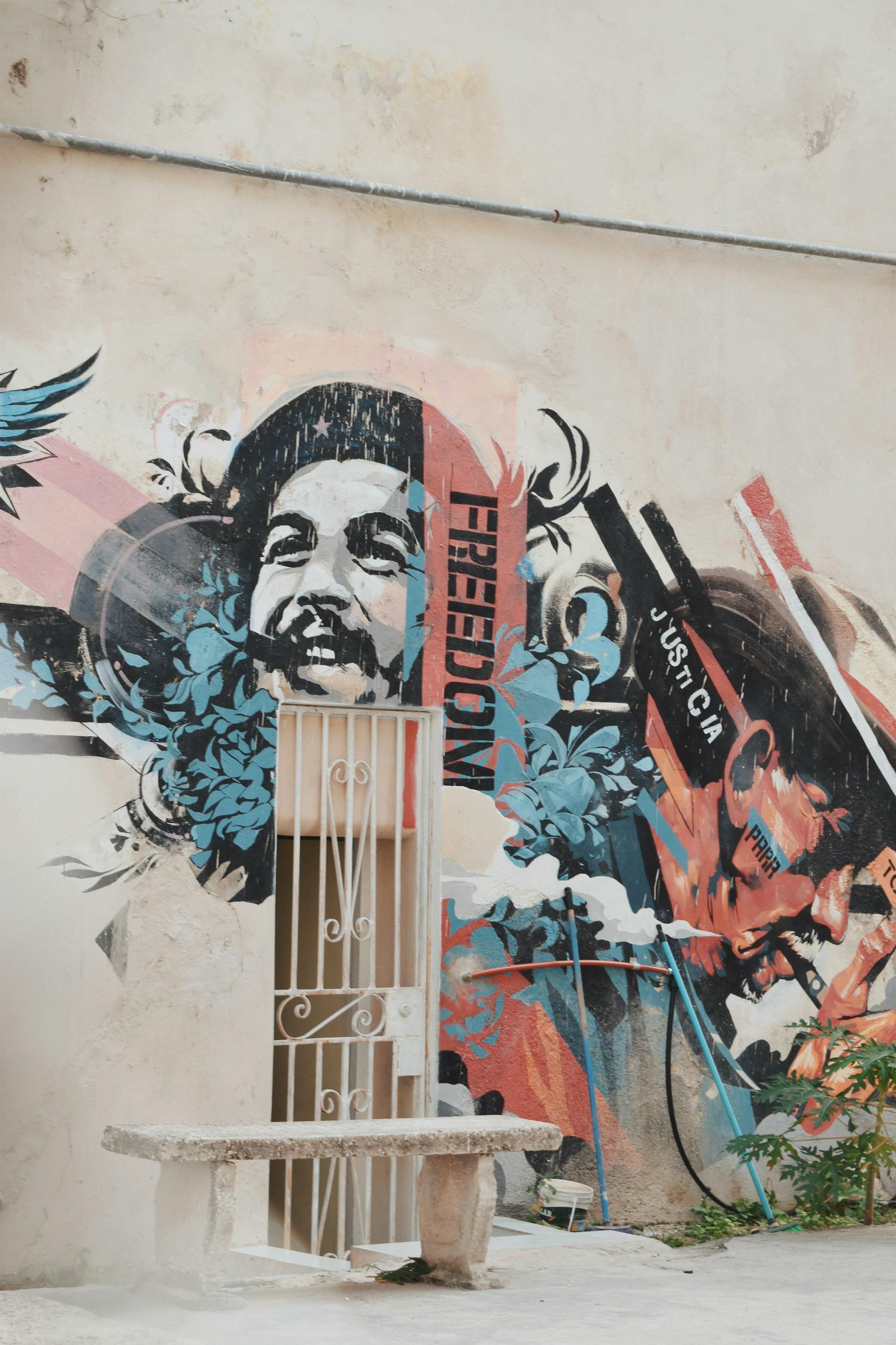 Che Guevara mural on a building in Havana