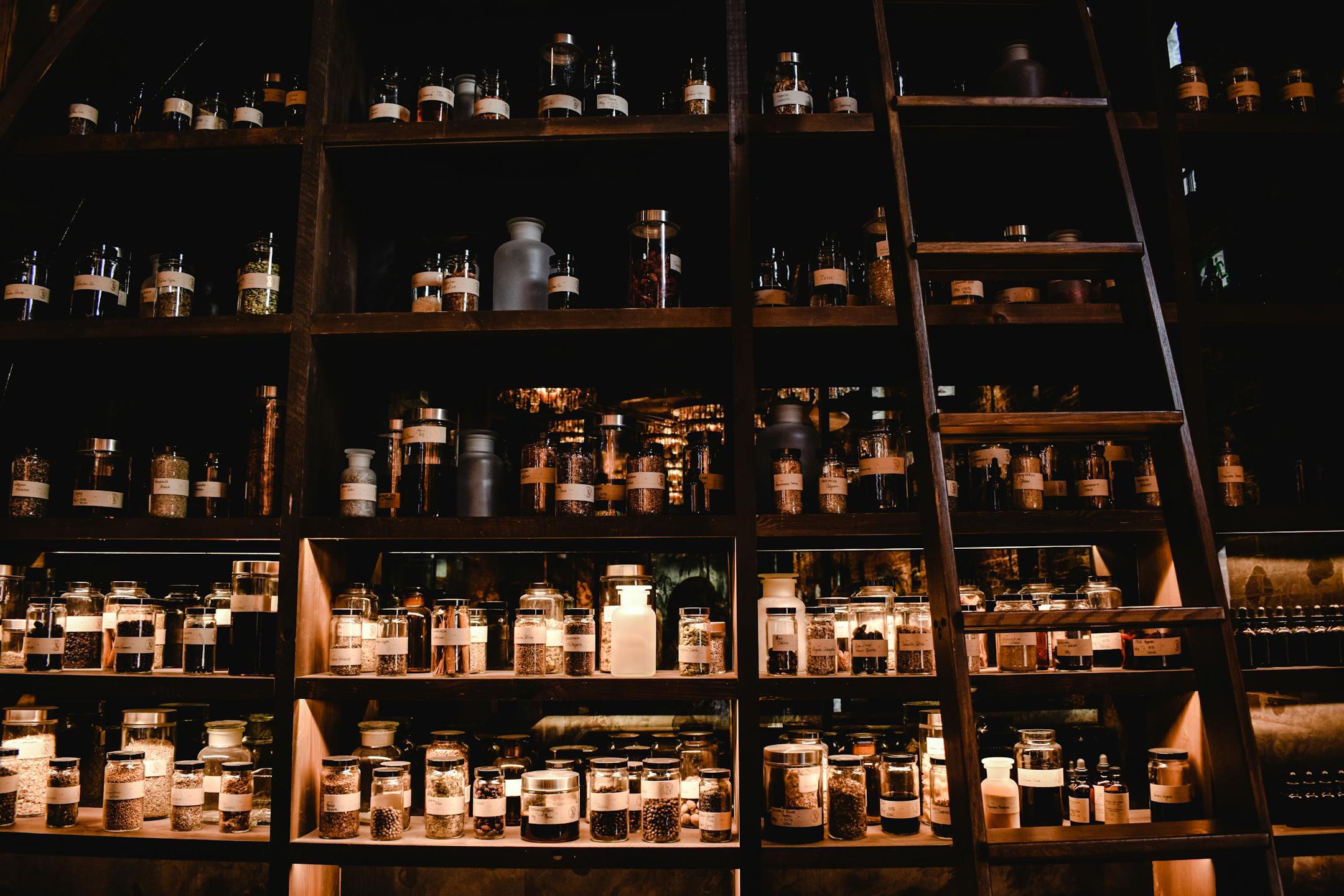Dimly lit apothecary shelves filled with assorted glass bottles and jars, creating a vintage ambiance.