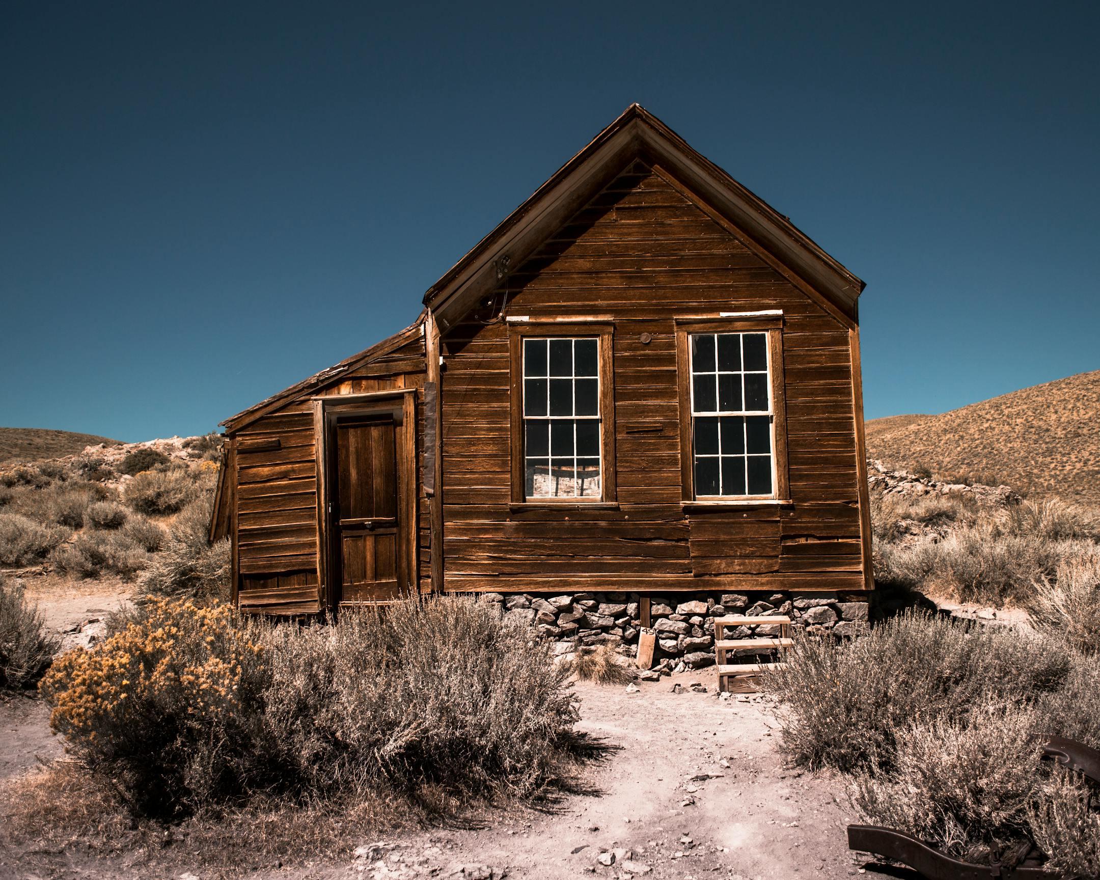 Explore this rustic wooden cabin amid the arid landscape of Bridgeport, California.