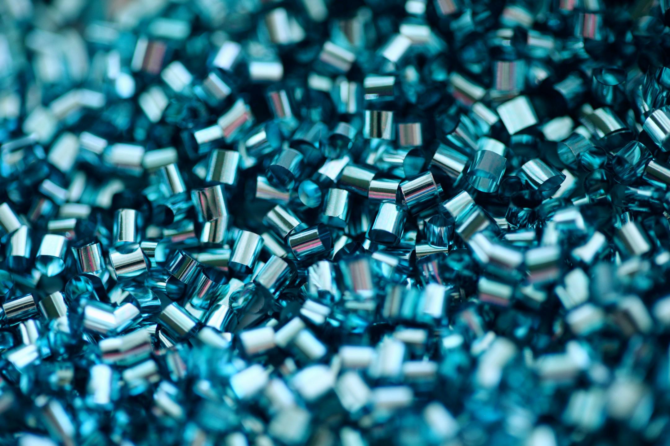 Close up of tiny pieces of plastic confetti on the window sill for natural lighting. I am trying to stay creative while on quarantine during the Covid-19 pandemic. Our governor has extended social distancing and only essential businesses until the 4th of May. 