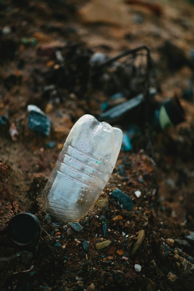 Plastic waste bottle pollution of the environment