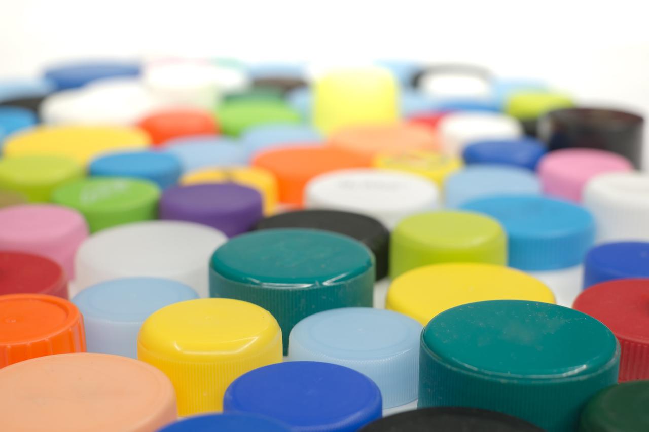 Plastic bottle caps made of recycled plastic.