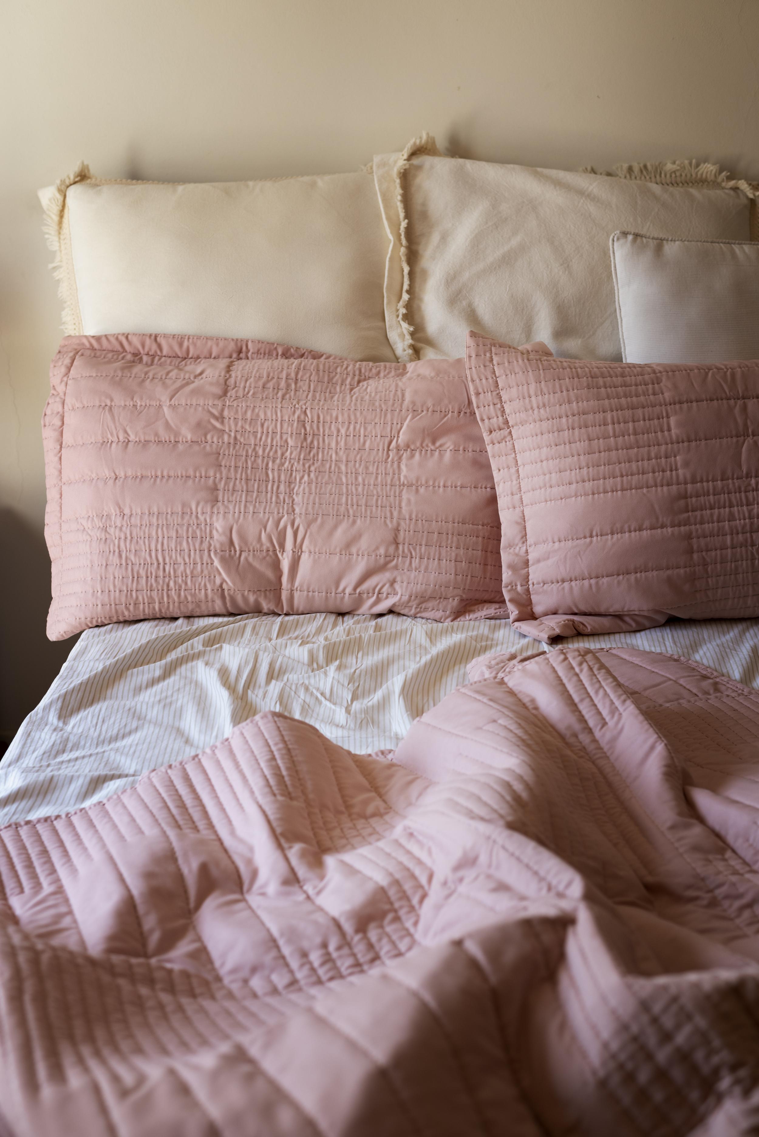 high-angle-cozy-bed-arrangement.jpg