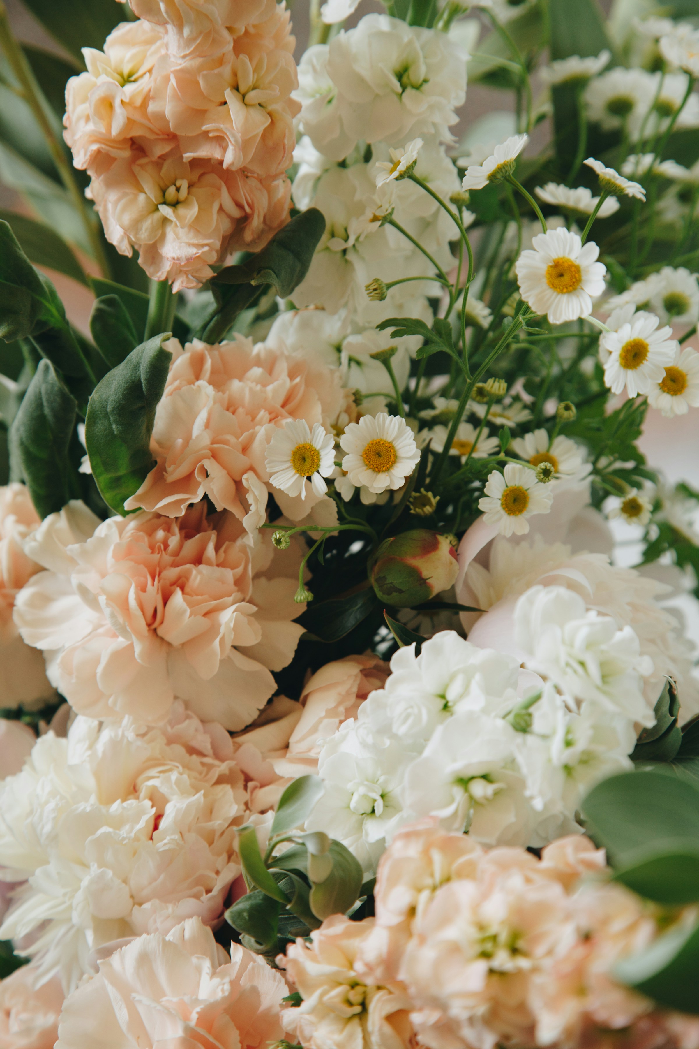 Overhead view of elegant floral arrangement with mixed flowers