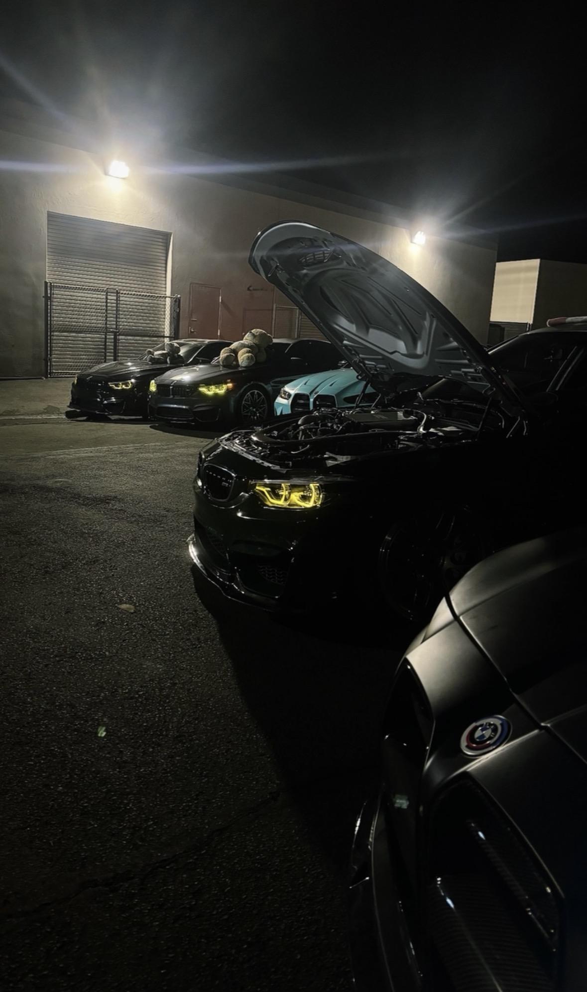 High-performance BMW M car in professional garage