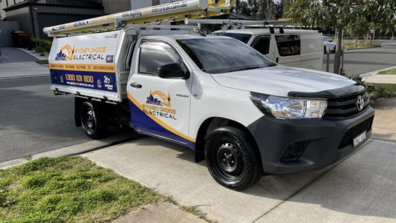 Professional electrician working in residential home