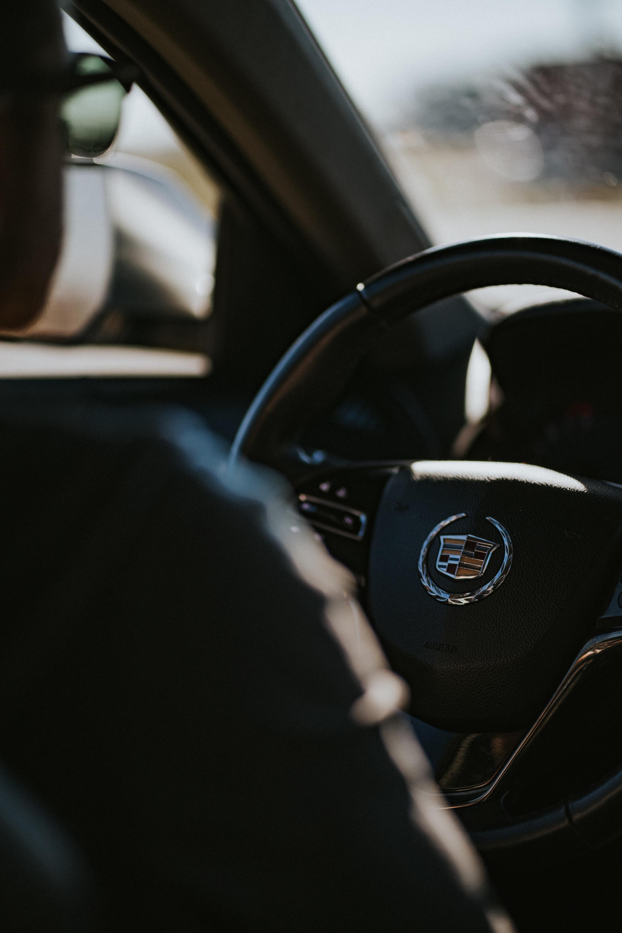 The front seat of a Cadillac.
