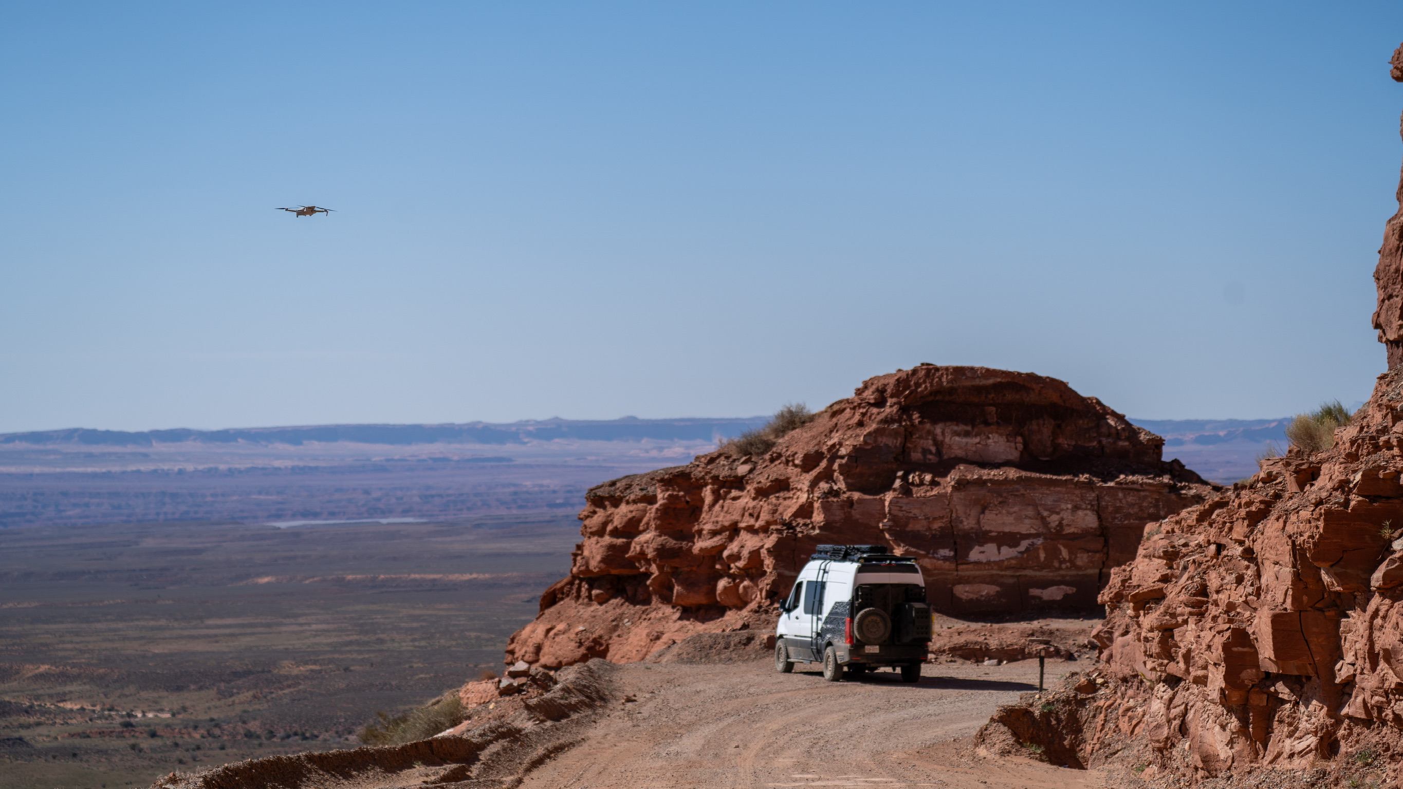 Overland expedition truck crossing rugged terrain