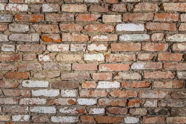 wall-old-brick-building-with-peeled-plaster-painted-surface.jpg
