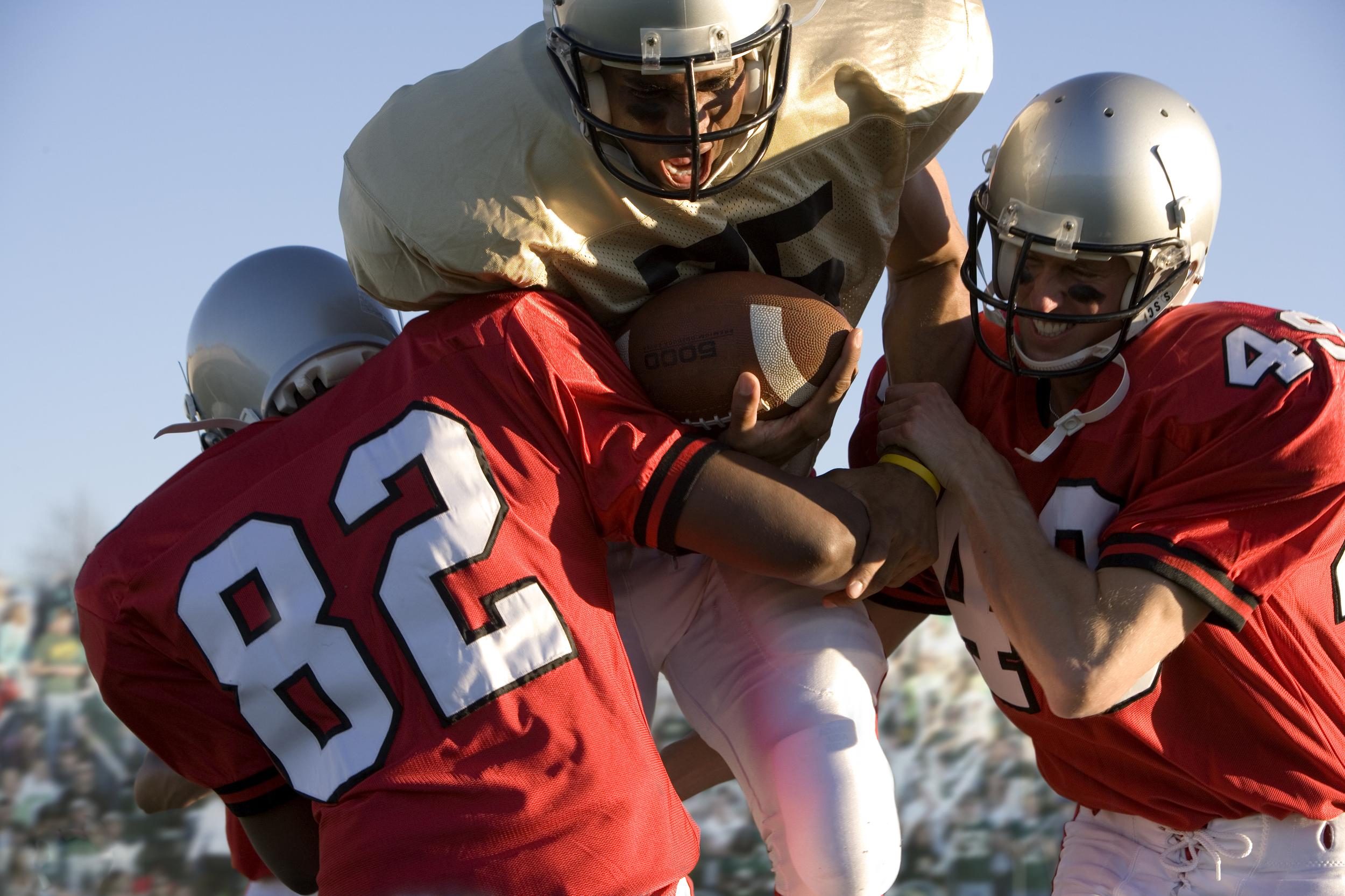american-football-players-tackling-during-game-on-2026-03-26-03-41-01-utc.jpg