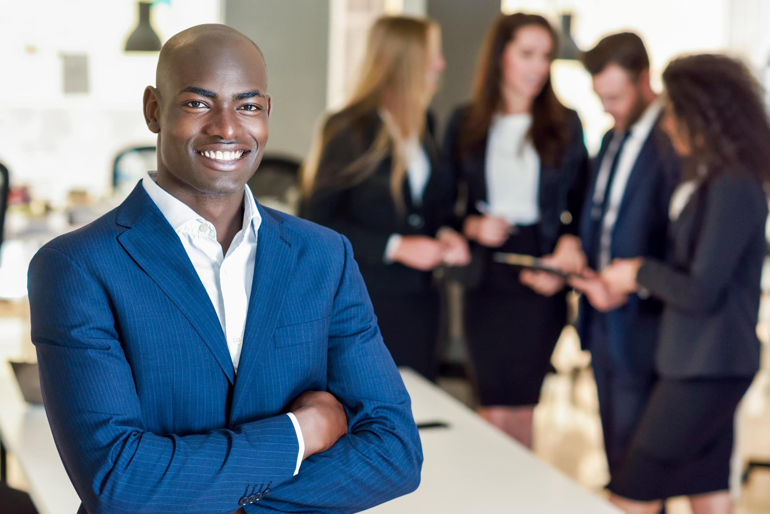 businessman-leader-modern-office-with-businesspeople-working.png
