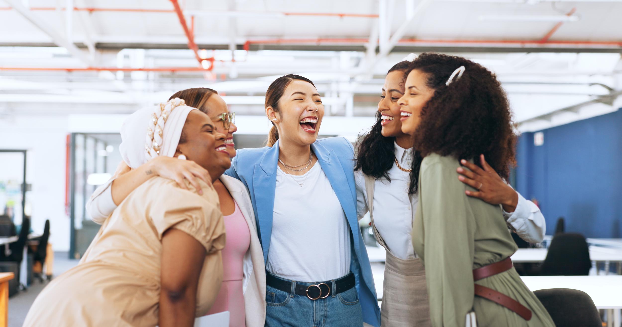 business-women-in-team-building-hug-for-office-cel-2025-04-06-09-00-12-utc.jpg