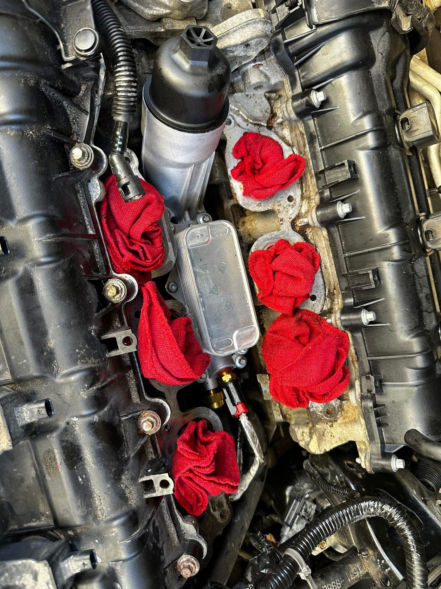 Professional mobile auto repair technician performing on-site vehicle maintenance and repairs