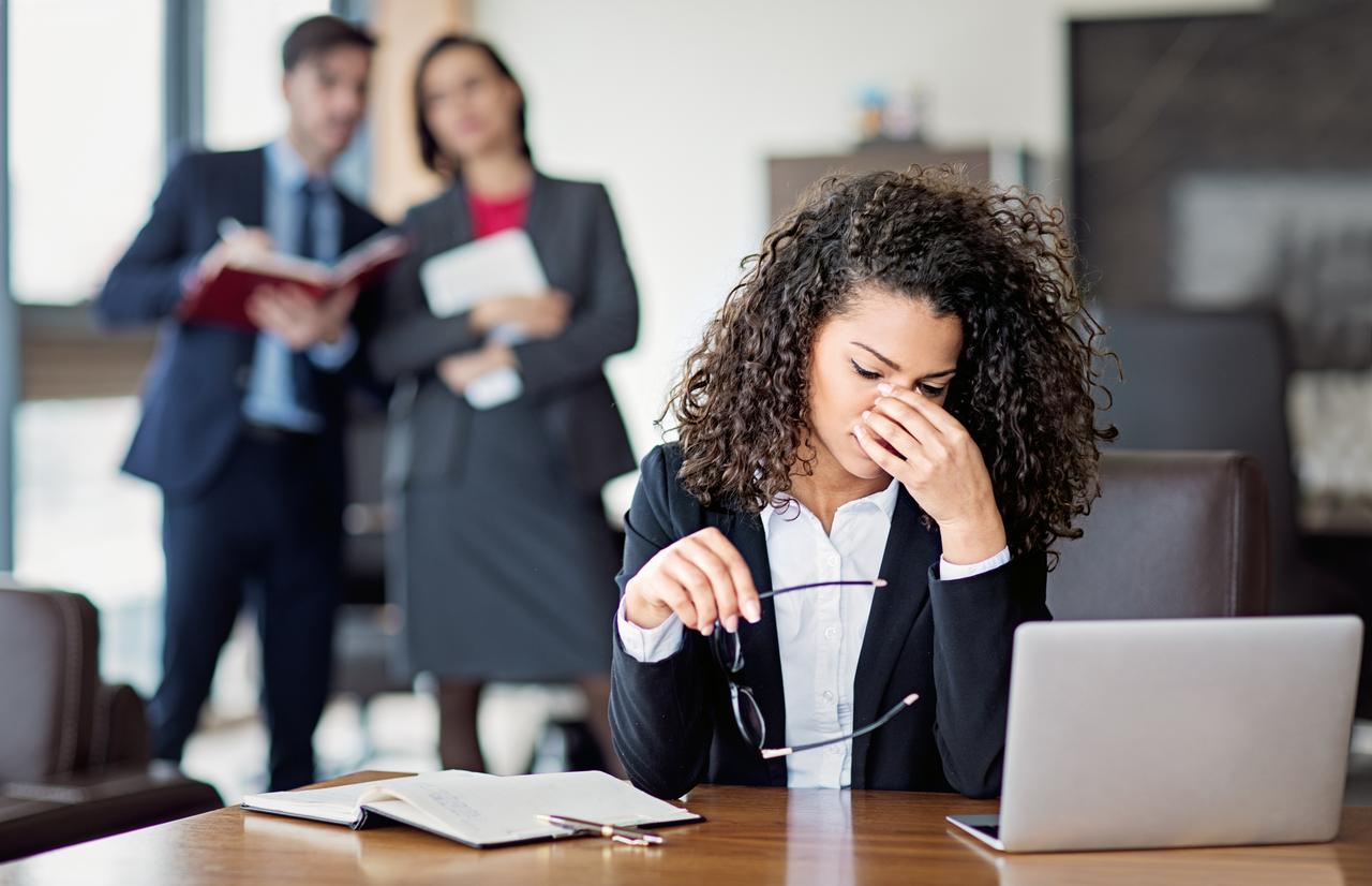 Woman in a toxic work environment