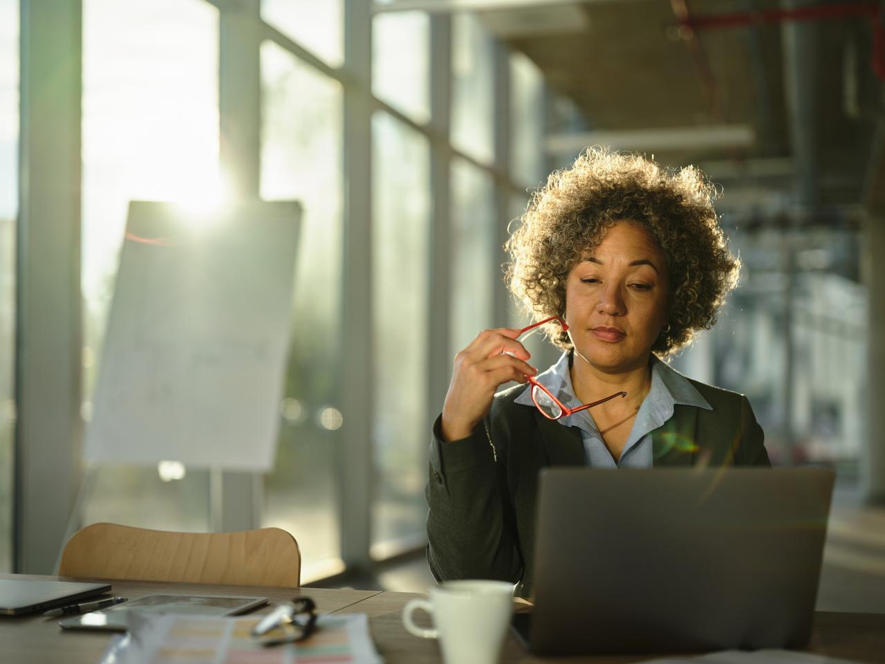 Female executive thinking