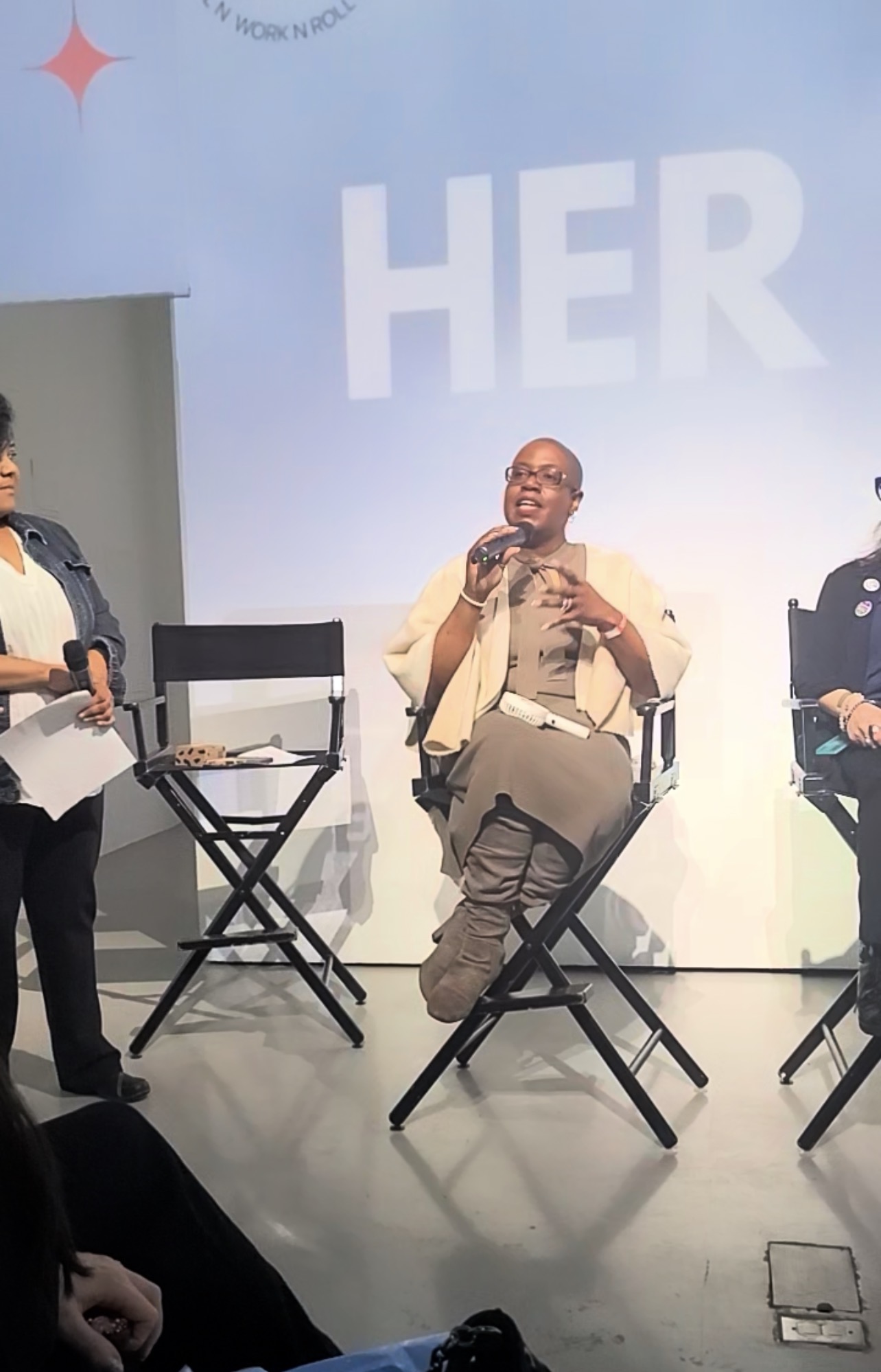 Hope Eder speaking as panelist at HER XP event in New York City