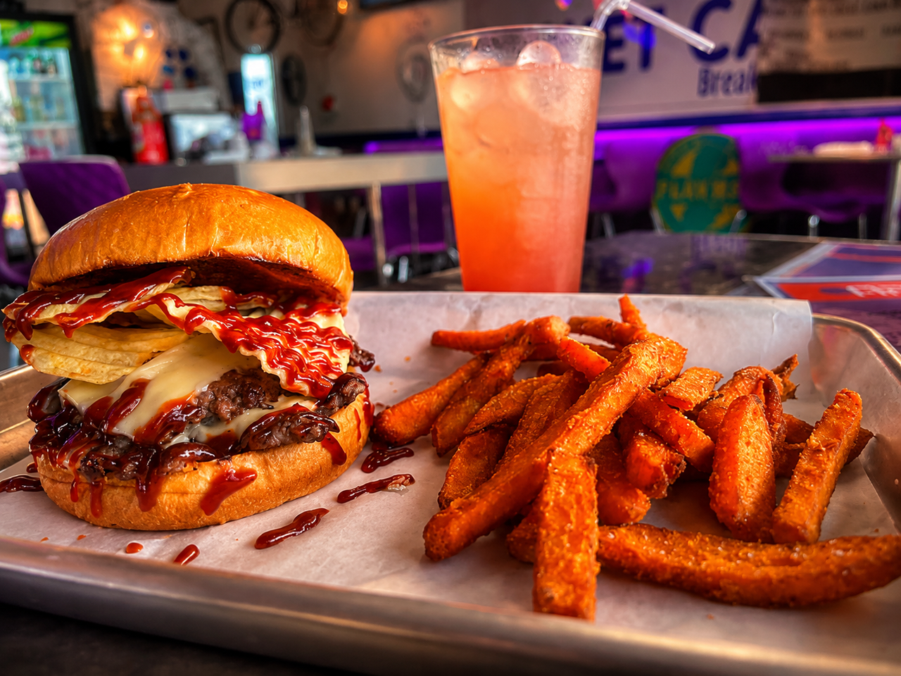 Gourmet smash burger with melted cheese and caramelized onions