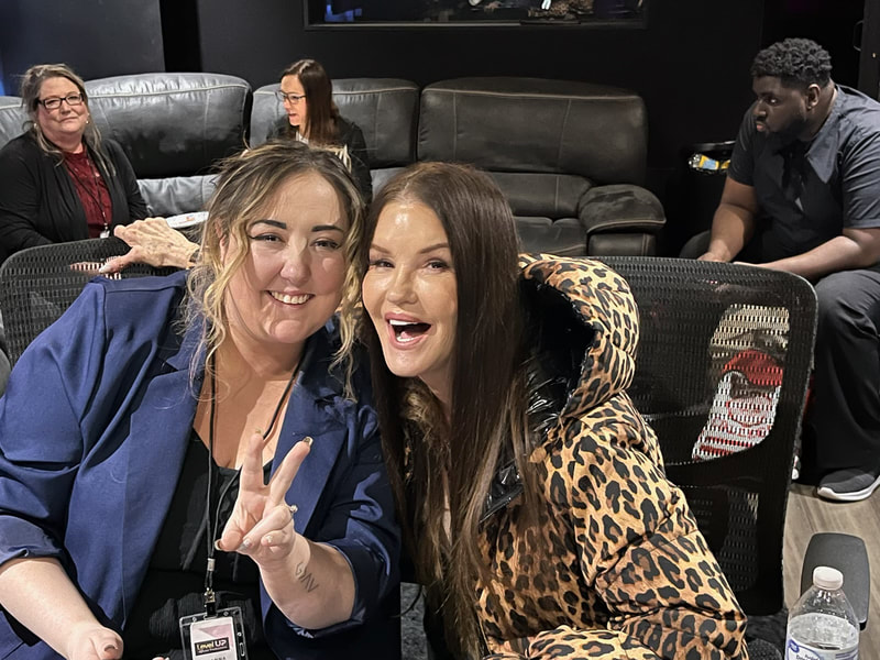 Songwriters collaborating in studio