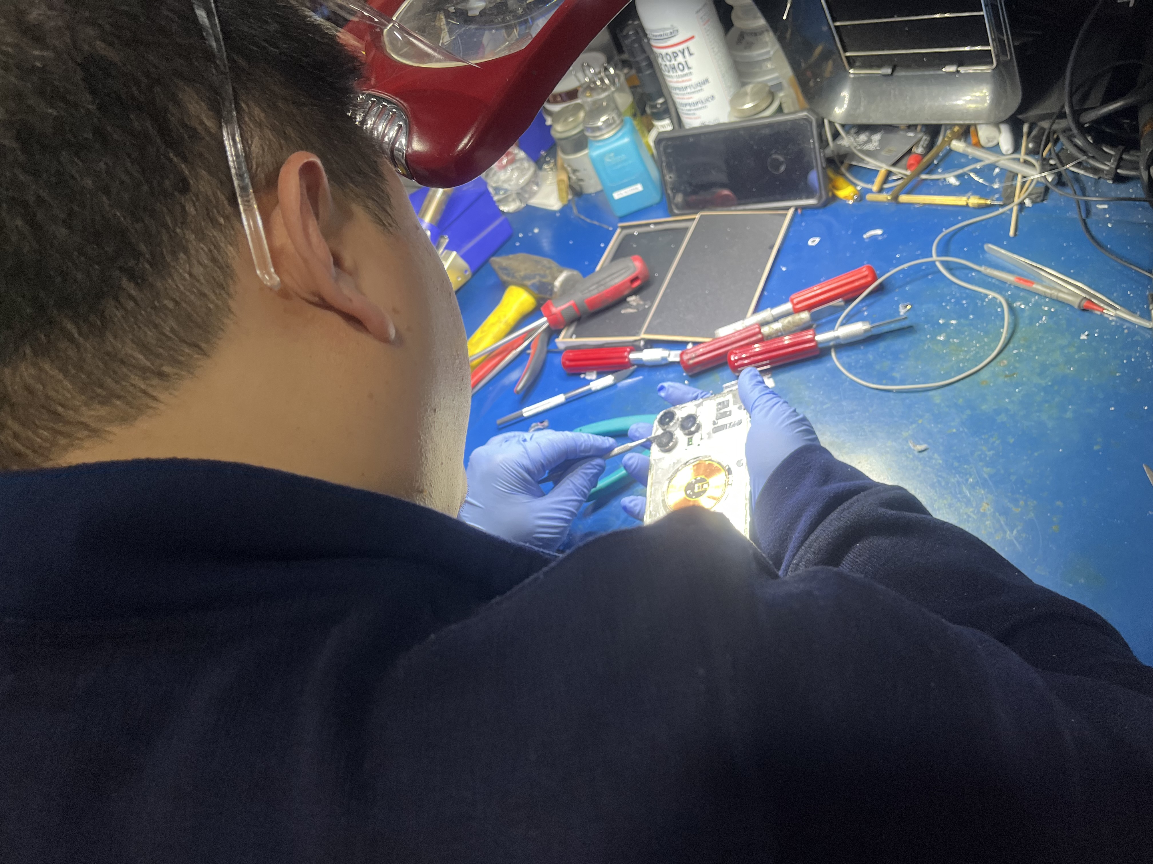 Mobile device repair service in action