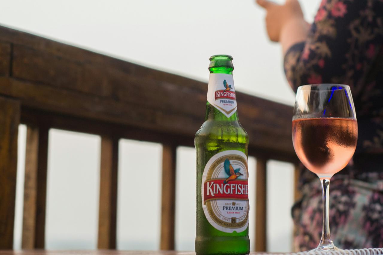 Walking into a roadside shack on a west facing beach in Goa. Wine and Beer!