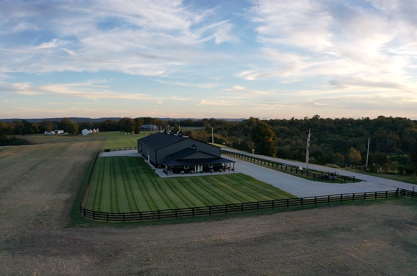 The Barn at 4C Farm - Rustic wedding venue at golden hour