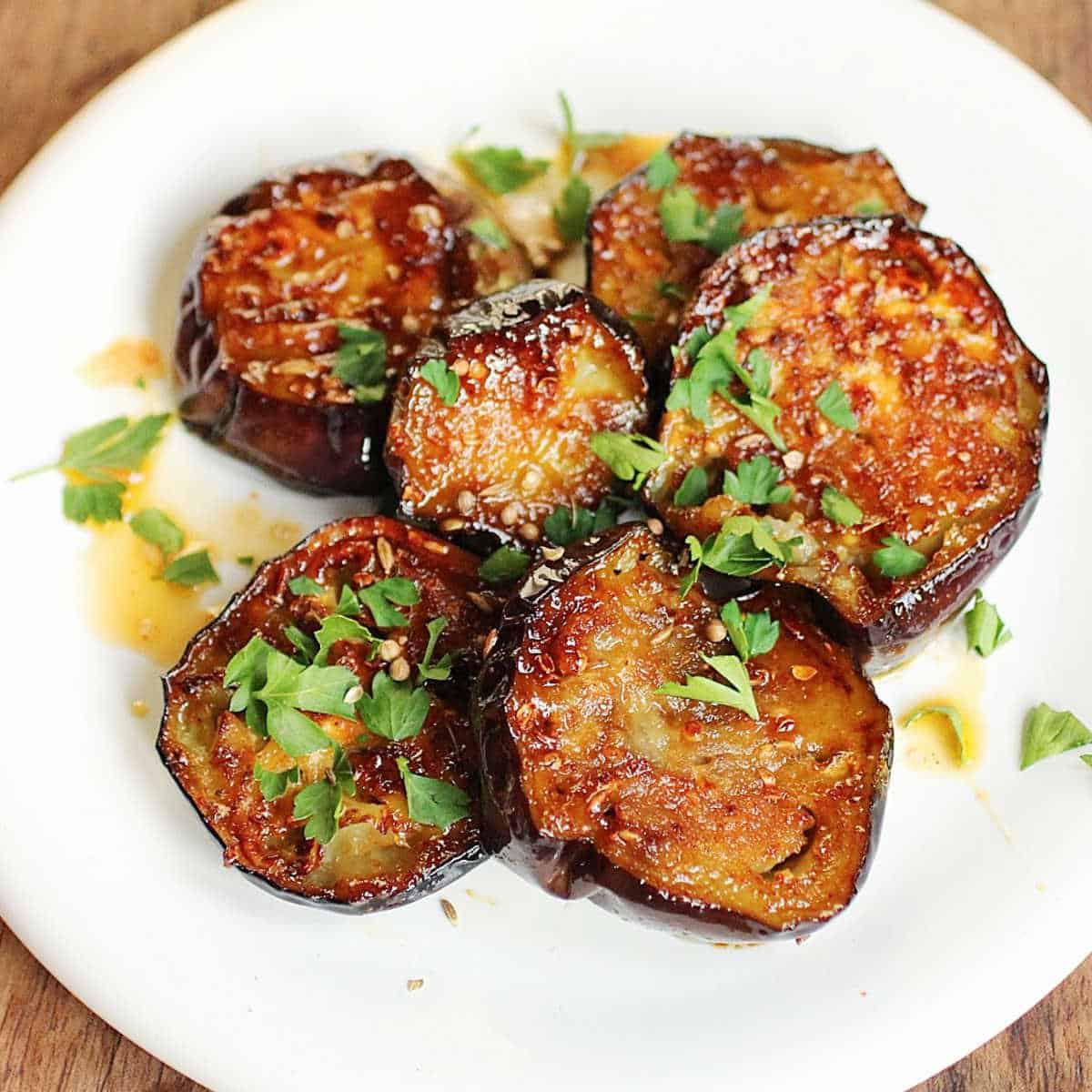 honey-eggplant-rounds-on-a-white-plate.jpeg