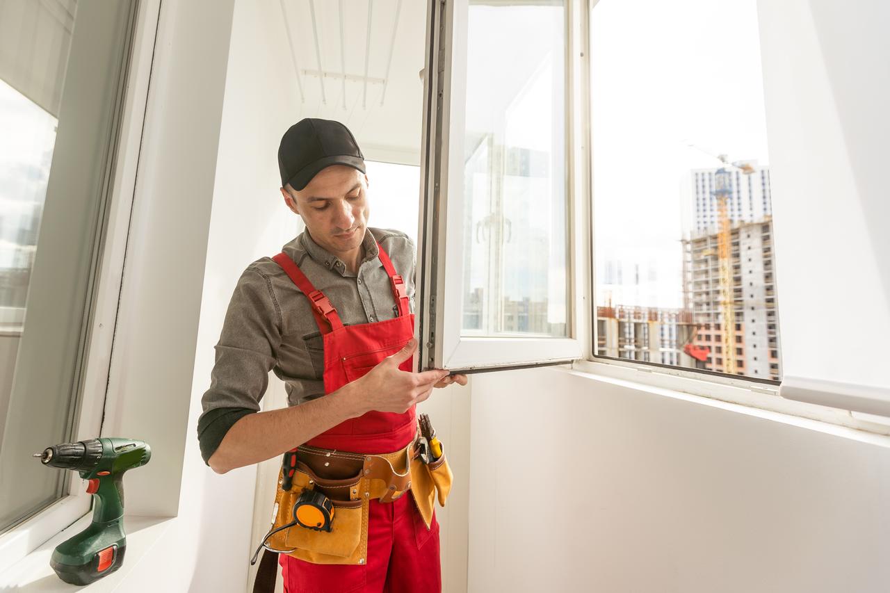 handyman-repairing-window-inside-apartment-during-2026-03-17-07-21-01-utc.jpg