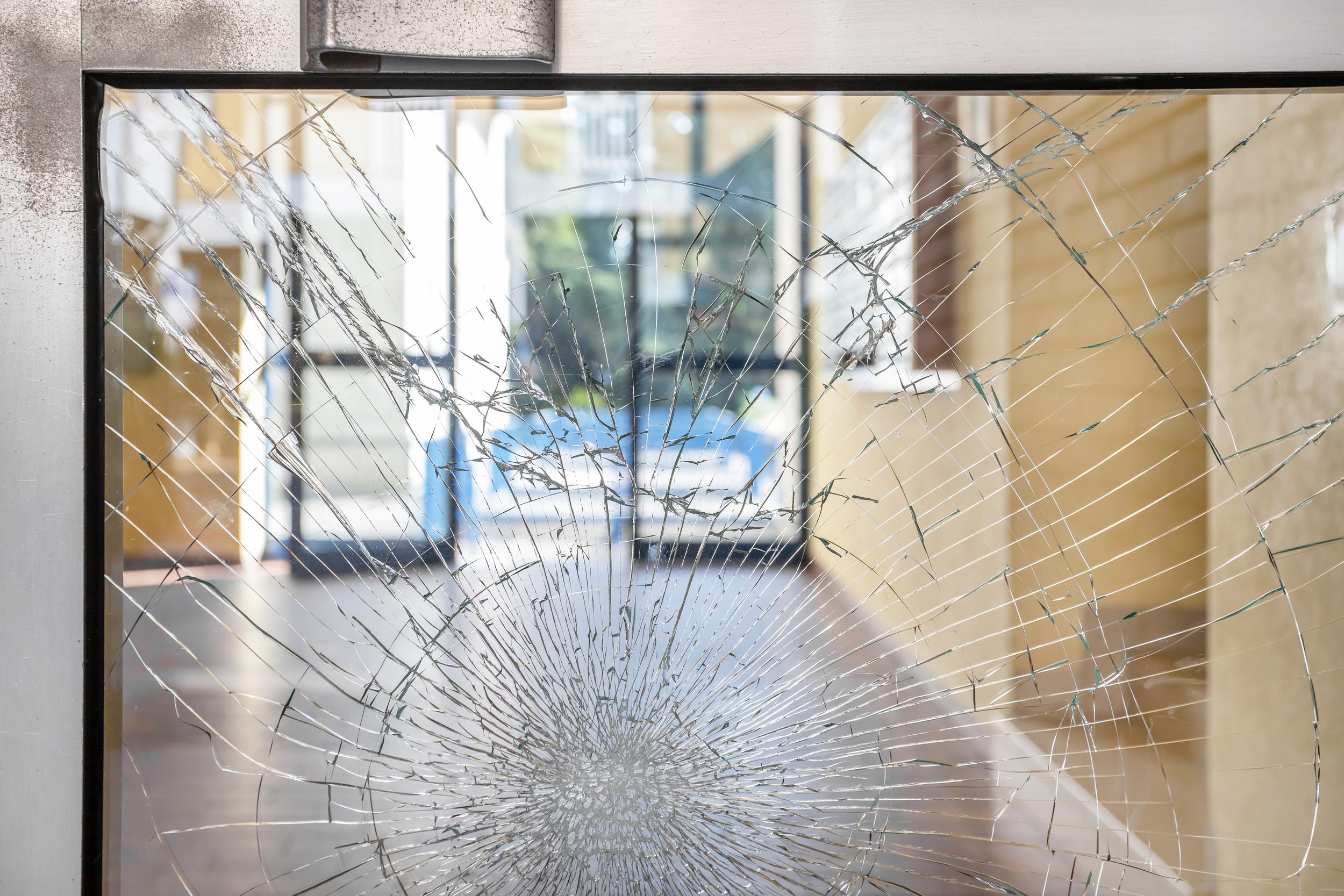 shattered-glass-window-in-an-urban-building-2026-03-16-00-46-13-utc.jpg