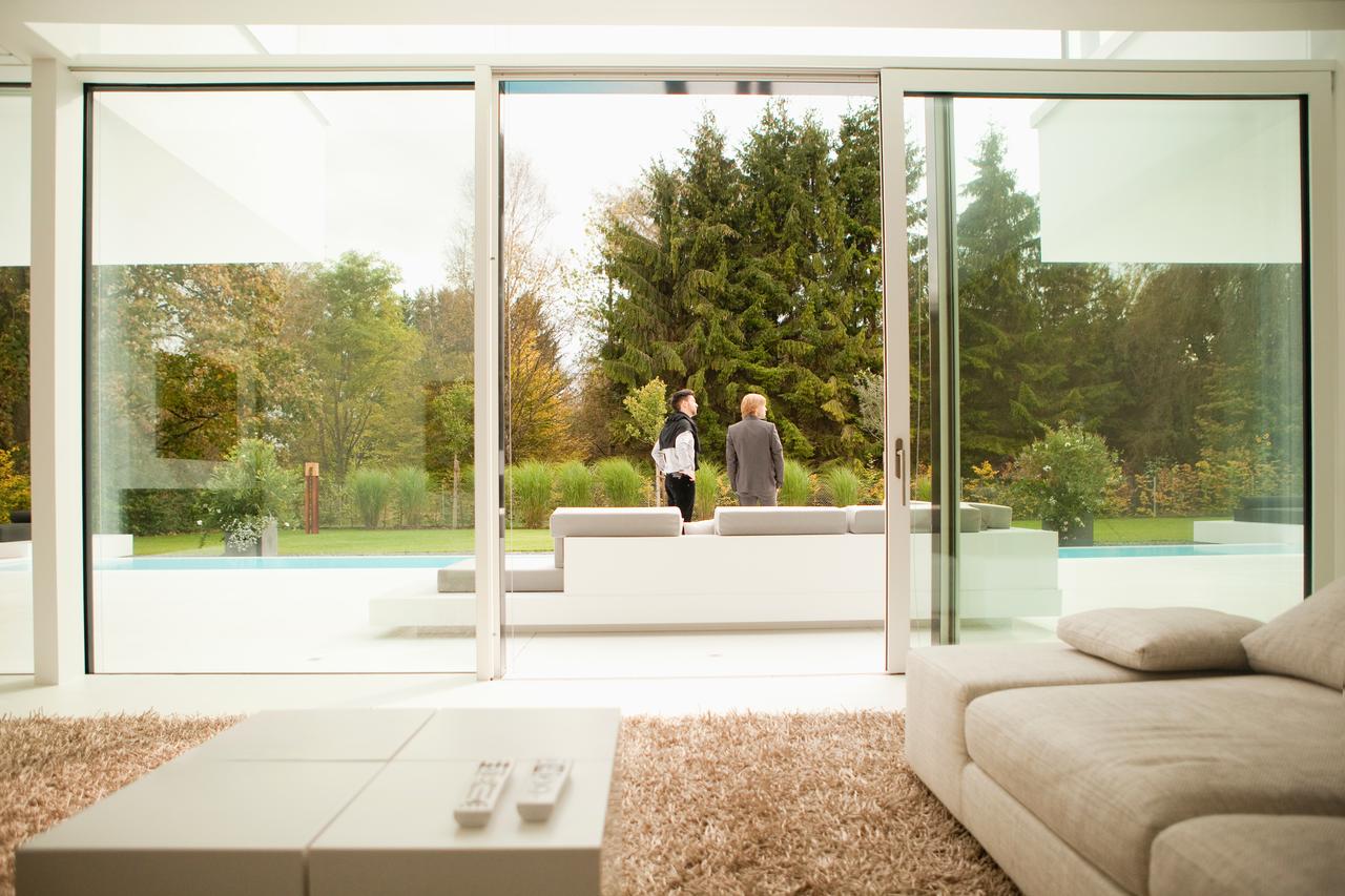 modern-home-with-outdoor-view-two-people-2026-03-26-08-30-25-utc.jpg