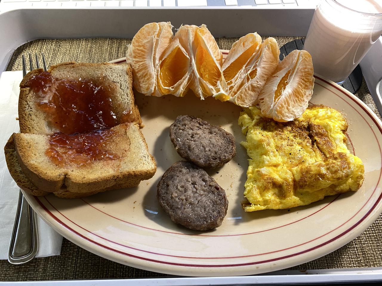 2 scramboled eggs & sausage b.jpeg