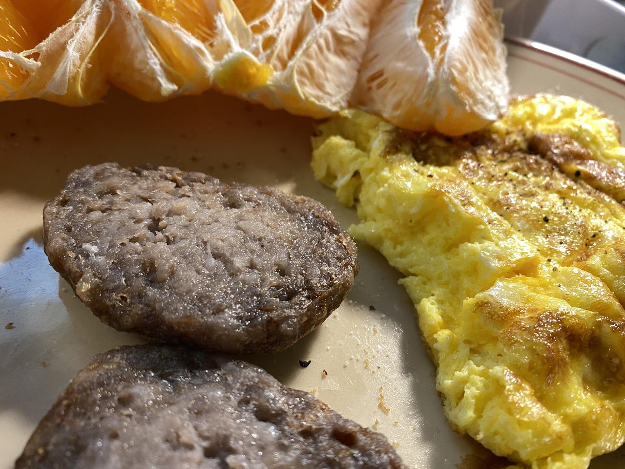 2 eggs scramboled & sausage.jpeg