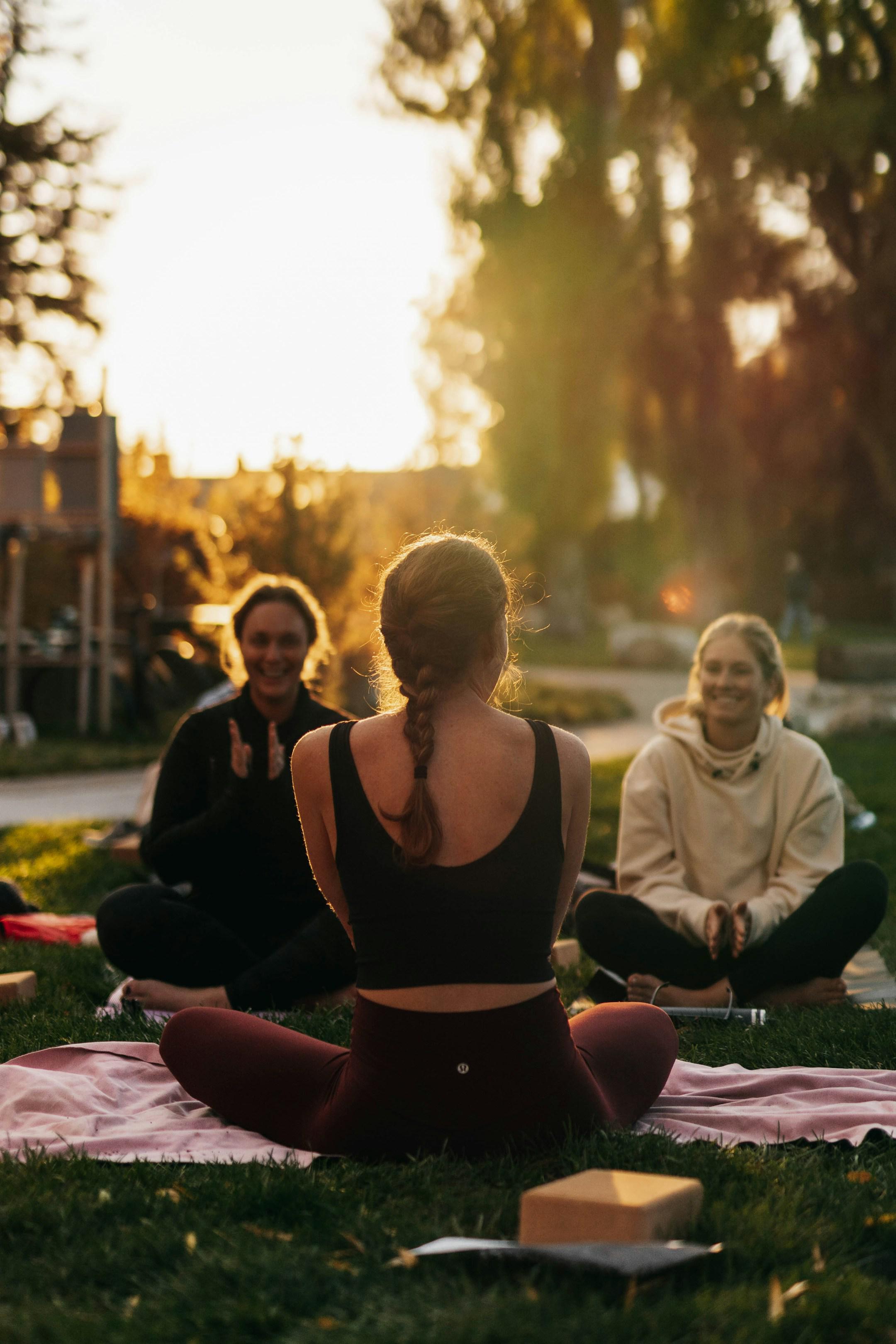 In a serene and tranquil setting, a group of empowered women gathers for a wellness retreat, embracing holistic healing. Radiating calmness and strength, engaging in activities that promote wellness, women's health, and overall empowerment.