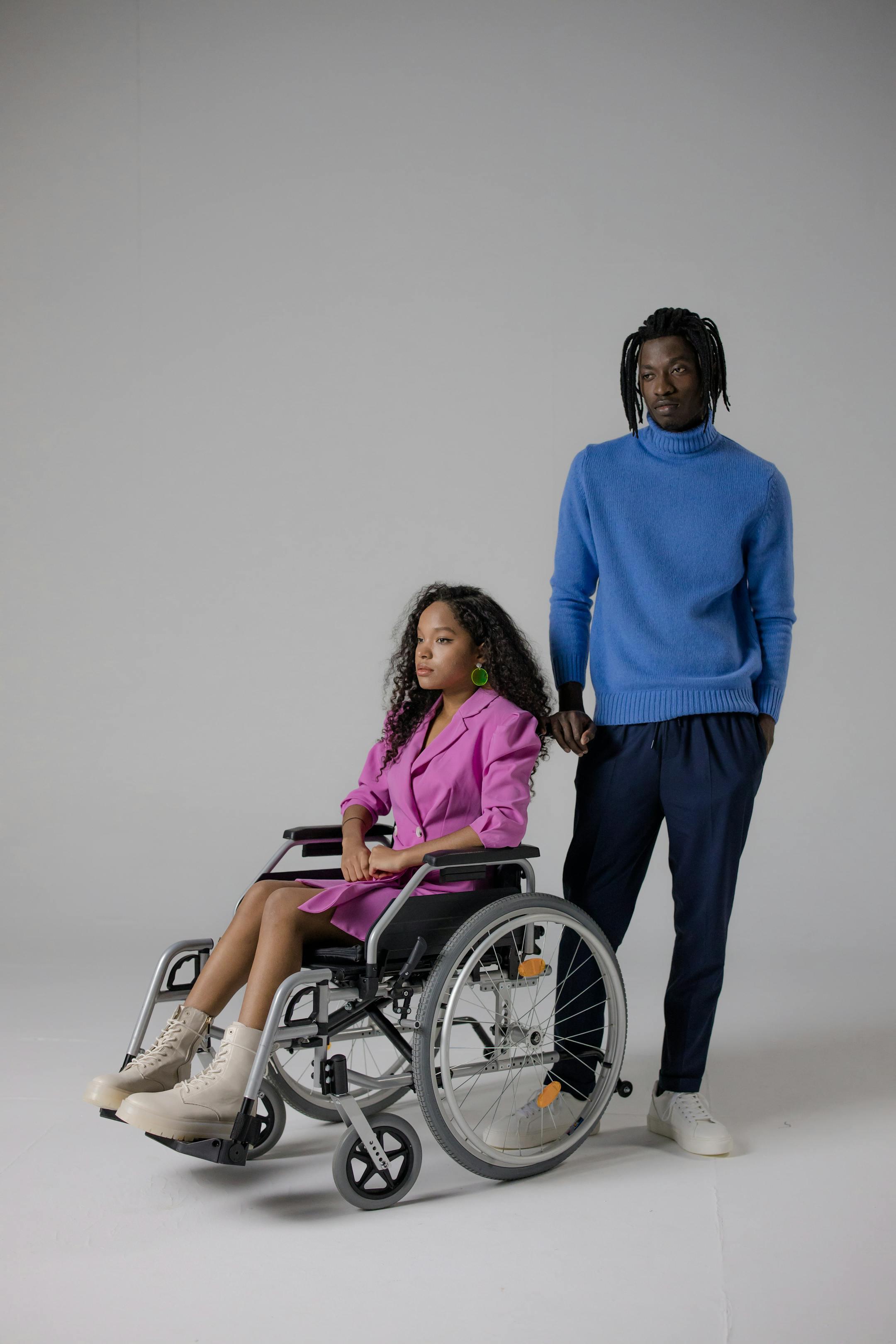 Stylish portrait of a man and woman embracing inclusivity and fashion.