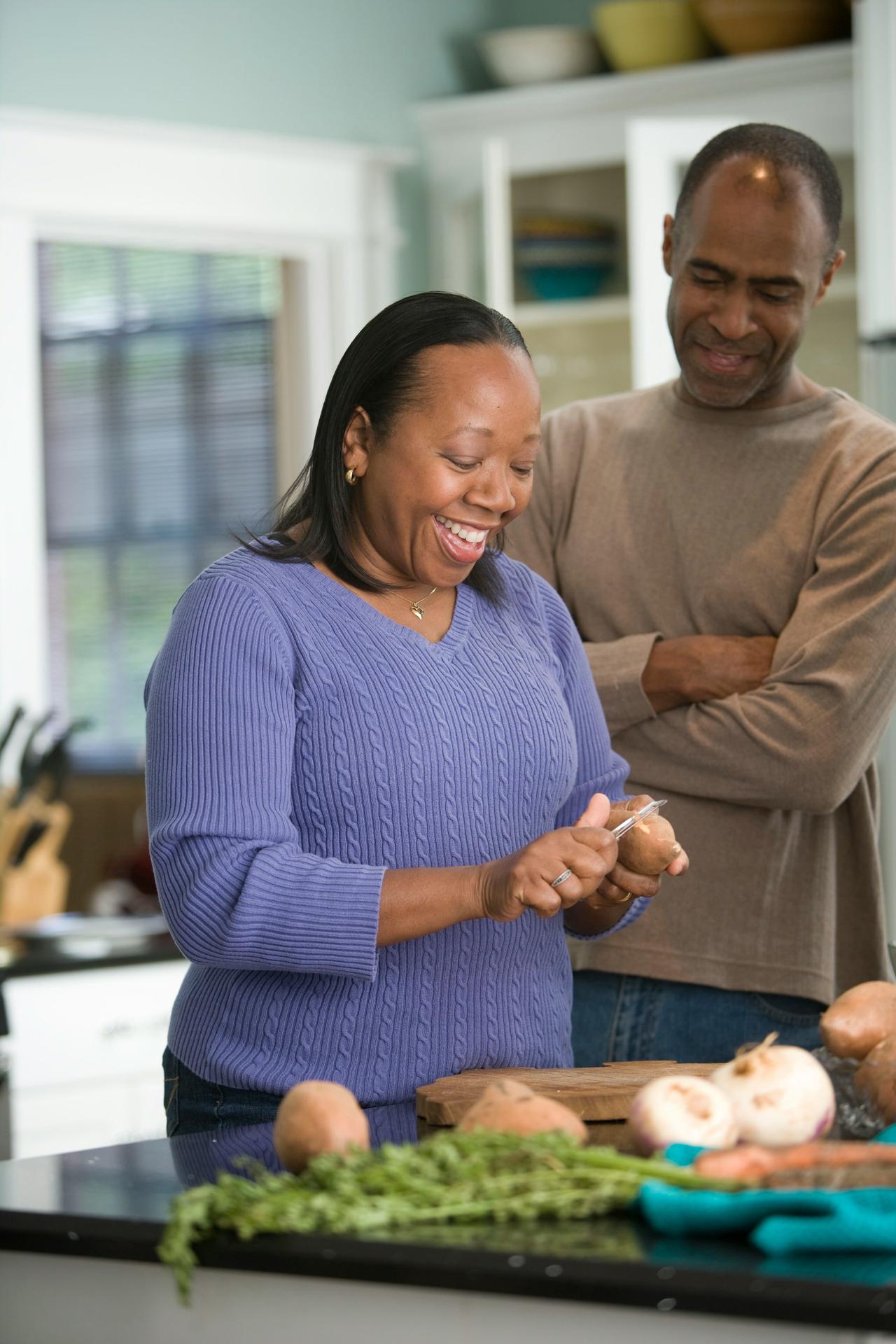 African American couple preparing a meal. Photo by Cade Martin