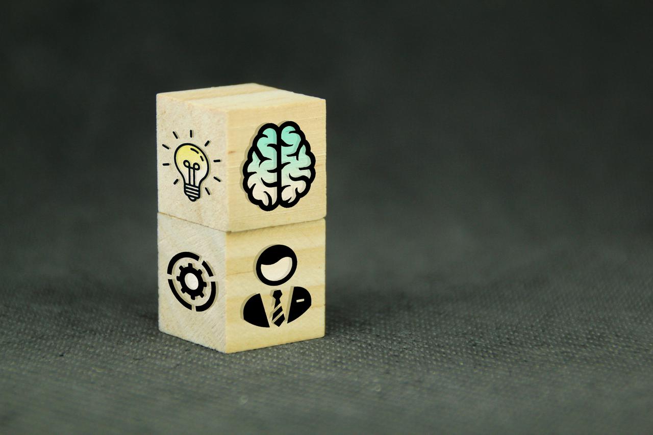 Wooden cube with symbols