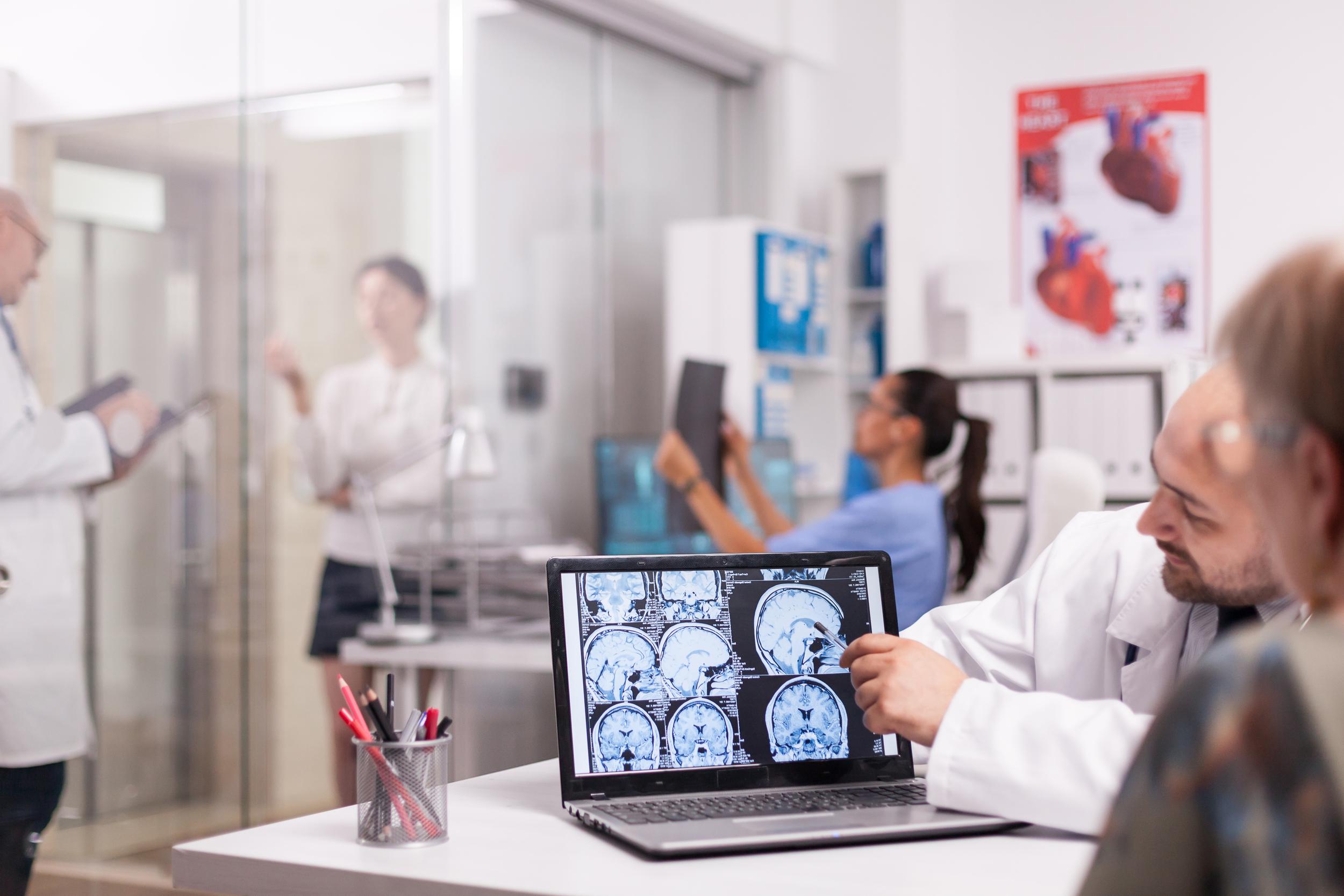 Doctor explaining brain injury