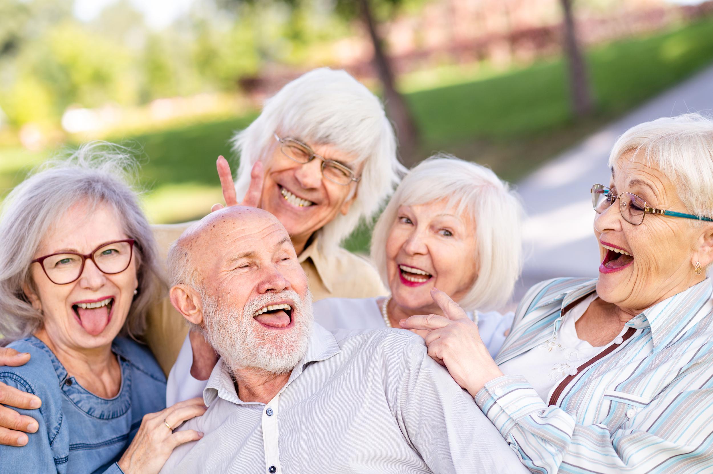 Group of senior people joking around