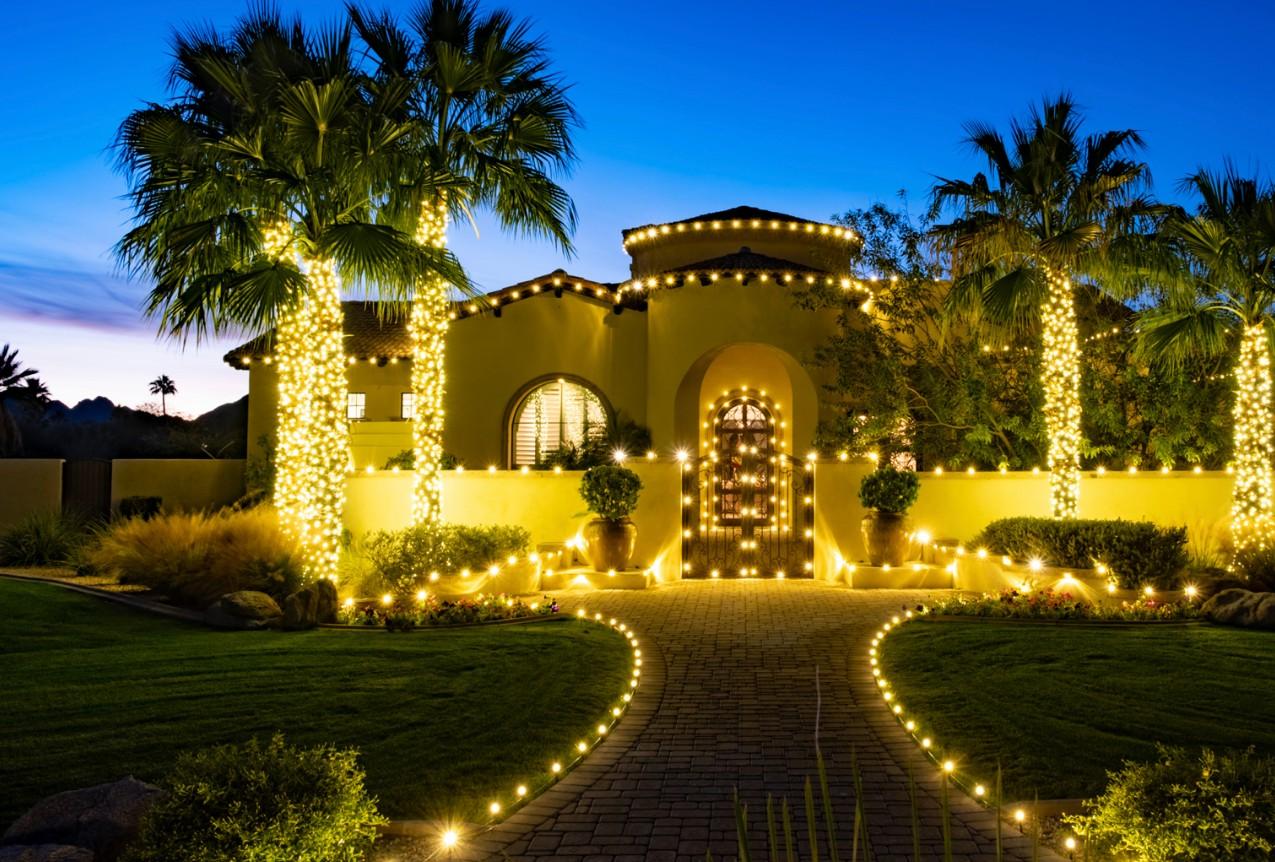 Southwest home entrance with holiday wreath and red ribbon
