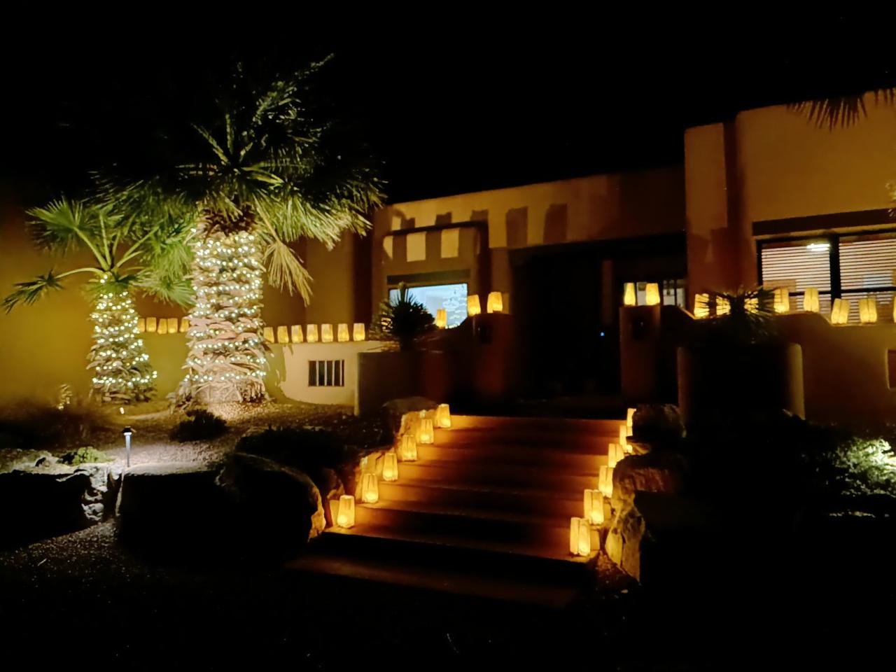 Southwest commercial plaza decorated with holiday garland and lights